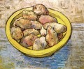 Nature morte Pommes de terre dans un plat jaune Vincent van Gogh